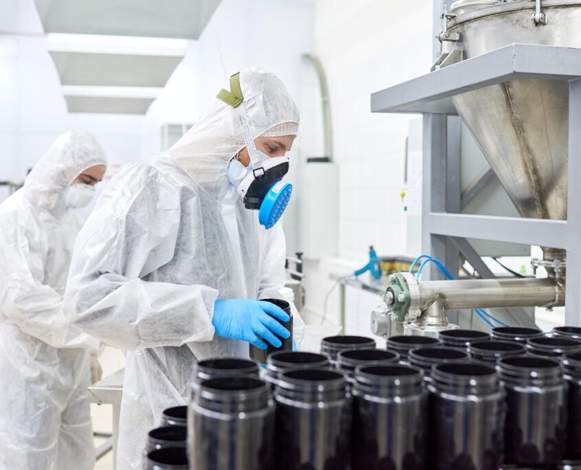 Worker filling supplemenet containers