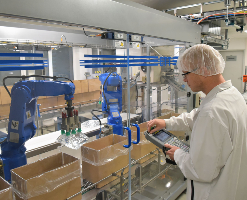 Professional packaging supplements into boxes with machinery